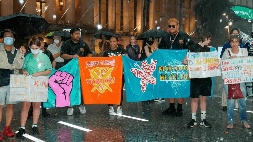 Protesters Braving the Rain on March 25th Protesting for Action on Climate Change