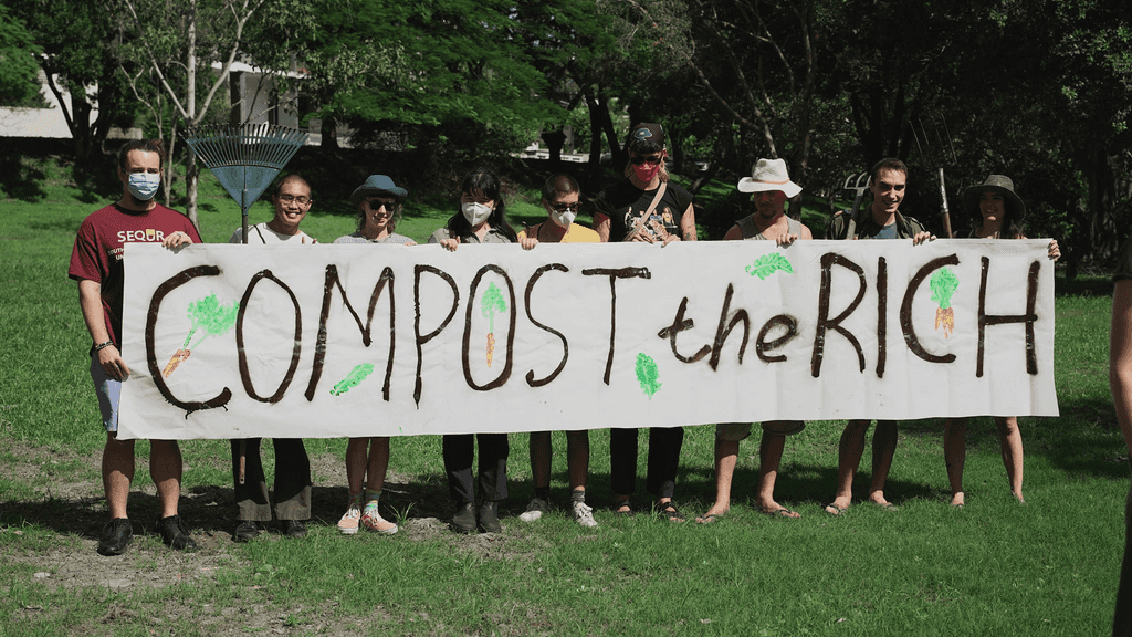 Members of Growing Forward preparing to defend their garden against the greed of property developers