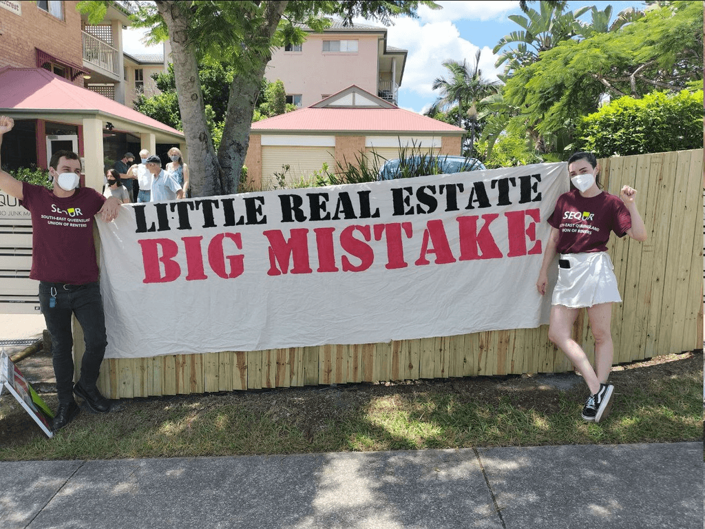 "SEQUR members outside of a Little Real Estate Open House"